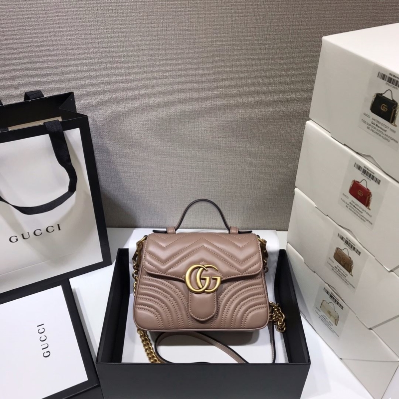 G*u*i top handle bags